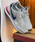 NIKE INTERNACIONAL GRIS ROJO